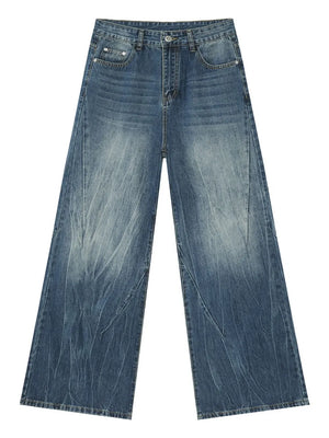Electric Drift Wide Leg Jeans in Medium wash denim with distressed detailing and a relaxed fit.