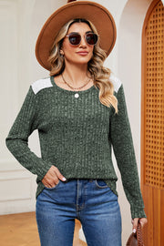 Matcha green ribbed knit top with eyelet shoulder detail and crew neck.