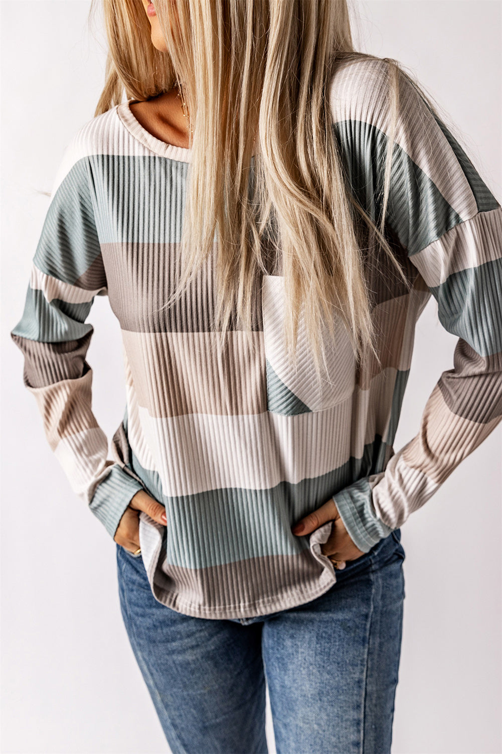 Ribbed stripe long sleeve top with patch pocket in charcoal and khaki tones.