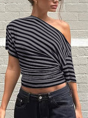 Dark gray and black striped cropped one-shoulder t-shirt with ruched detail.