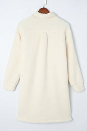 Beige sherpa coat with corduroy details and patch pockets, long sleeves, collared, casual outerwear.