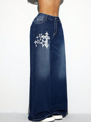 Dark wash cotton palazzo jeans with white cross and star graphic detail.