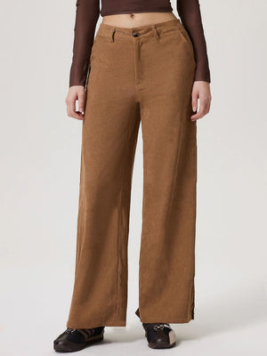 Corduroy wide-leg trousers in camel with a buttoned front.