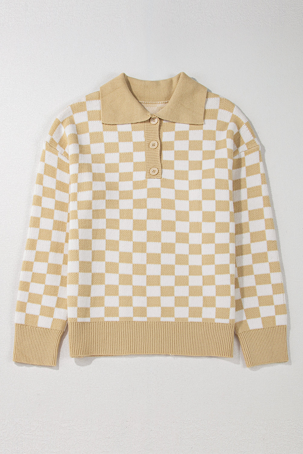 Tan and white checkerboard knit polo sweater with button detail