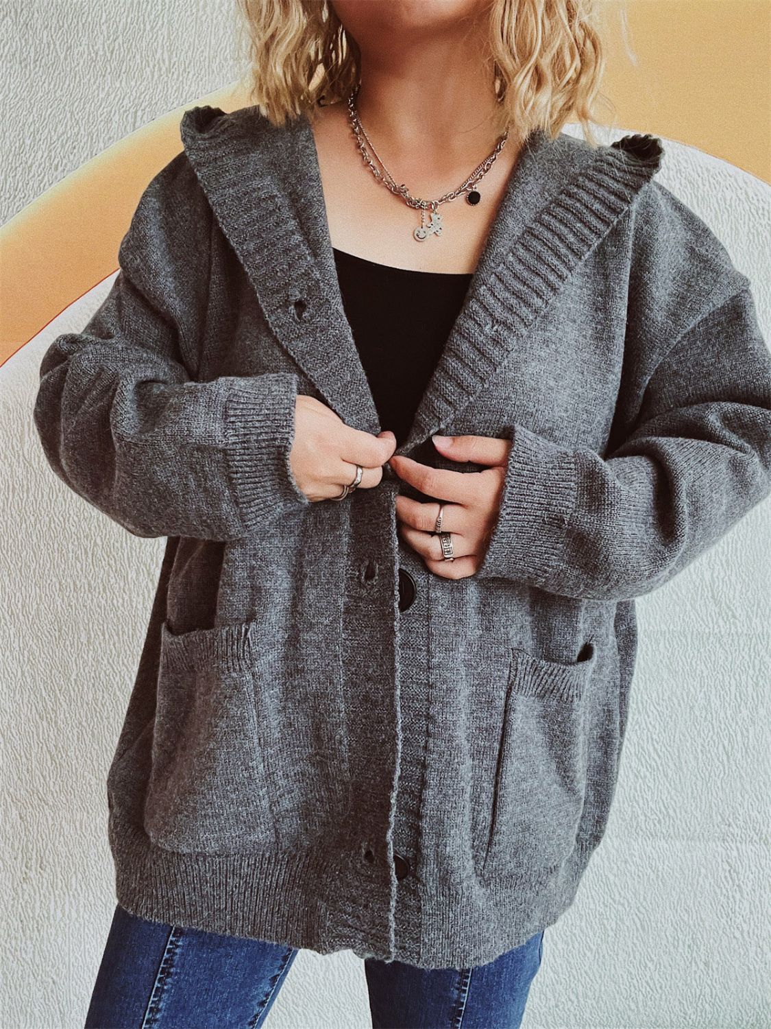 Dark gray chunky knit hooded button-down cardigan with pockets