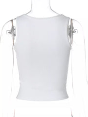 White ribbed cropped tank top with square neckline and rhinestone embellishments.