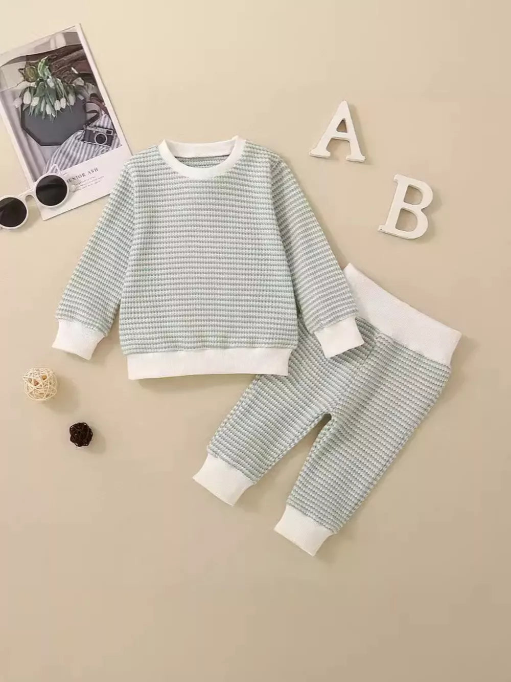 Light blue striped baby knit set with crewneck sweatshirt and pants