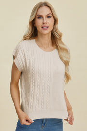 Beige cable knit cap sleeve pullover sweater with a crew neck.