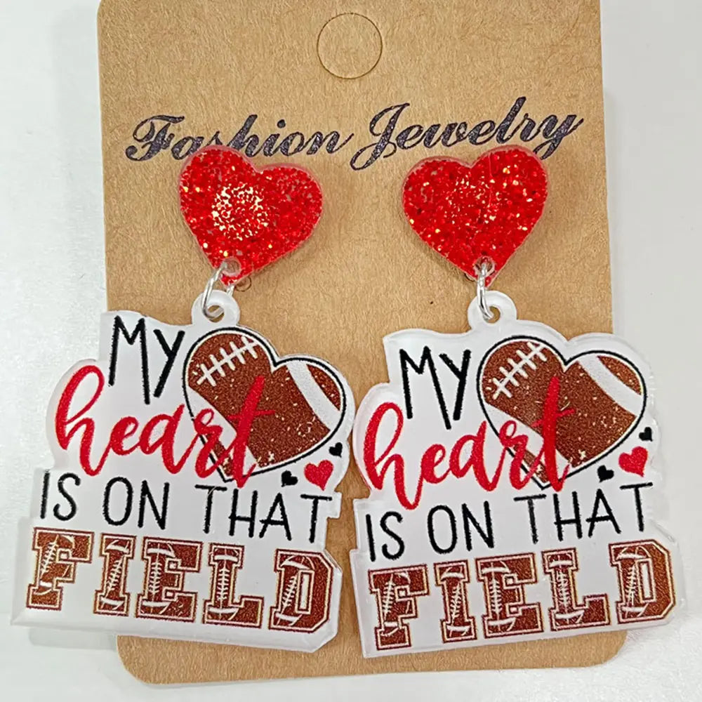 Game Day Acrylic Football Dangles with red glitter heart tops and football heart detail.