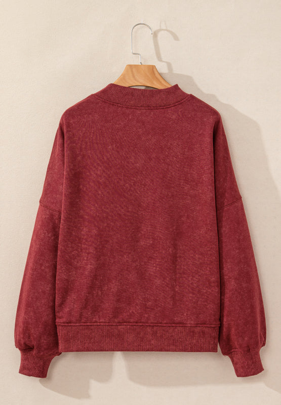 Acid wash mock neck sweatshirt in deep red with ribbed cuffs and hem.