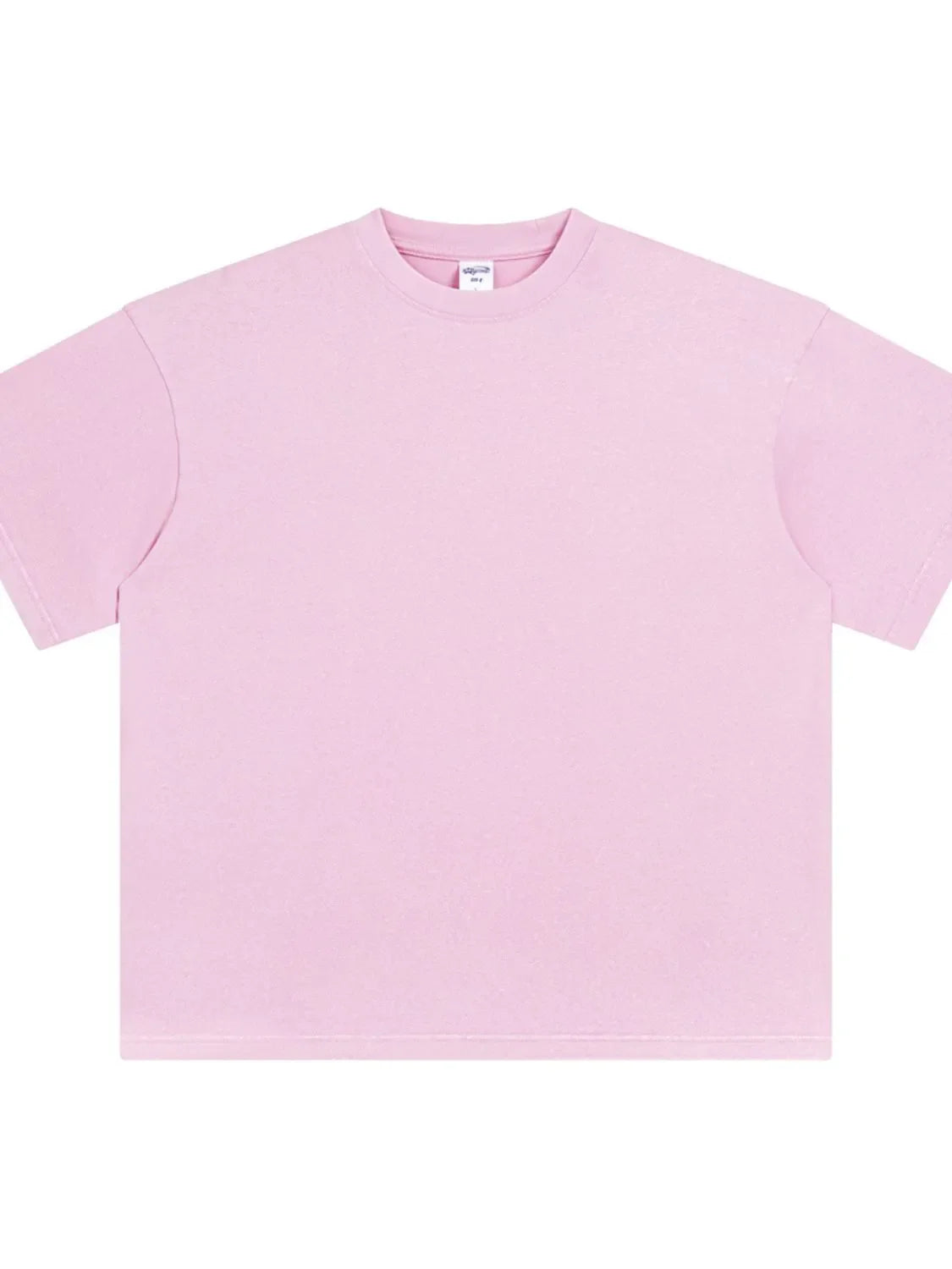 Acid wash oversized tee in blush pink with crewneck and short sleeves.