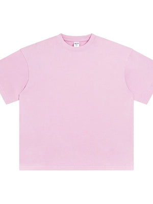 Acid wash oversized tee in blush pink with crewneck and short sleeves.