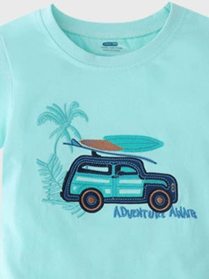Toddler graphic tee in aqua blue cotton with a car and surfboards applique and "Adventure Awaits" text.