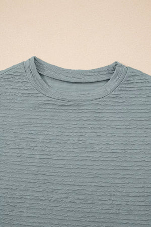 Textured crew neck t-shirt in air force blue with cap sleeves and a casual fit.