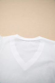 White cotton maternity t-shirt with V-neckline and flutter sleeves, delicate eyelet detail