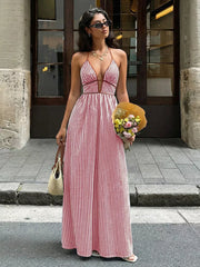 Elegant halter neck striped maxi dress in deep red with plunging neckline and tie straps.