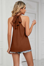 Brown halter top with a bow-back detail