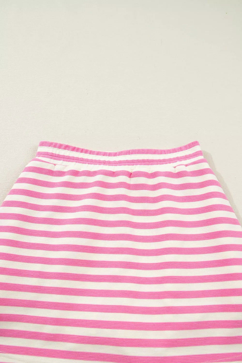 Pink and white striped bikini bottoms with elastic waistband