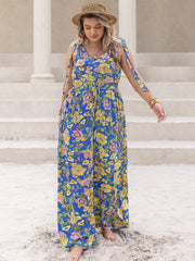 Blue floral tie-shoulder wide-leg jumpsuit with a drawstring waist.