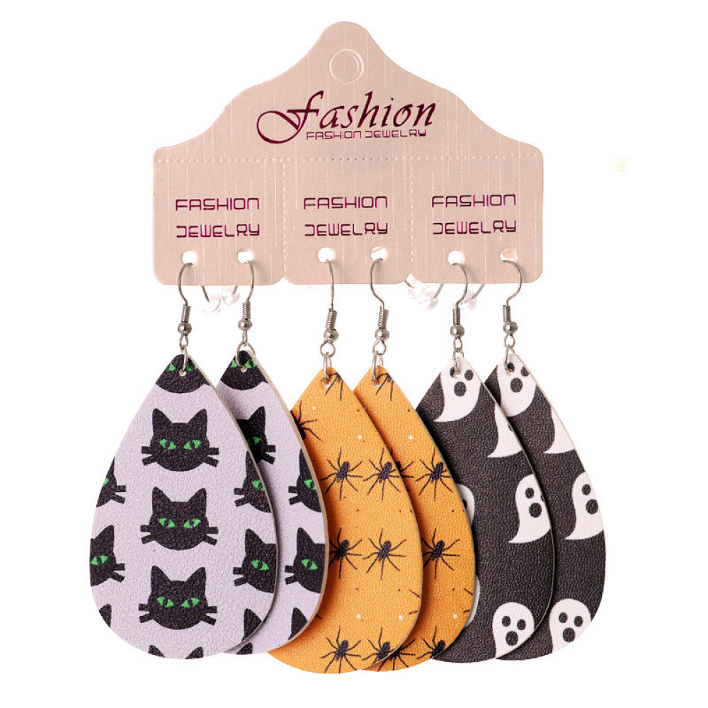Teardrop earrings with spooky cat, spider, and ghost prints in black, orange, and gray.