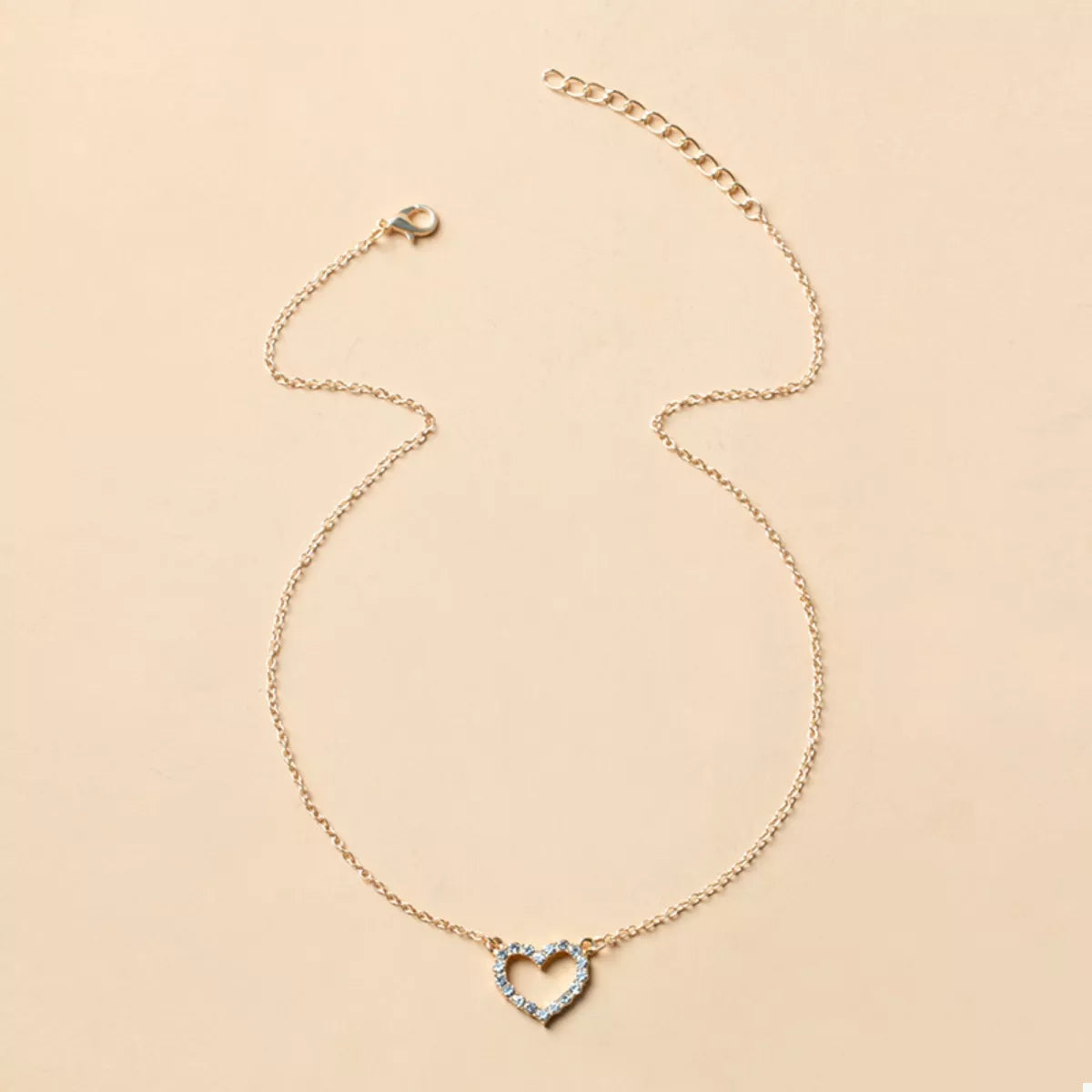 Gold dainty heart pendant necklace with clear stones, 18K gold-plated.