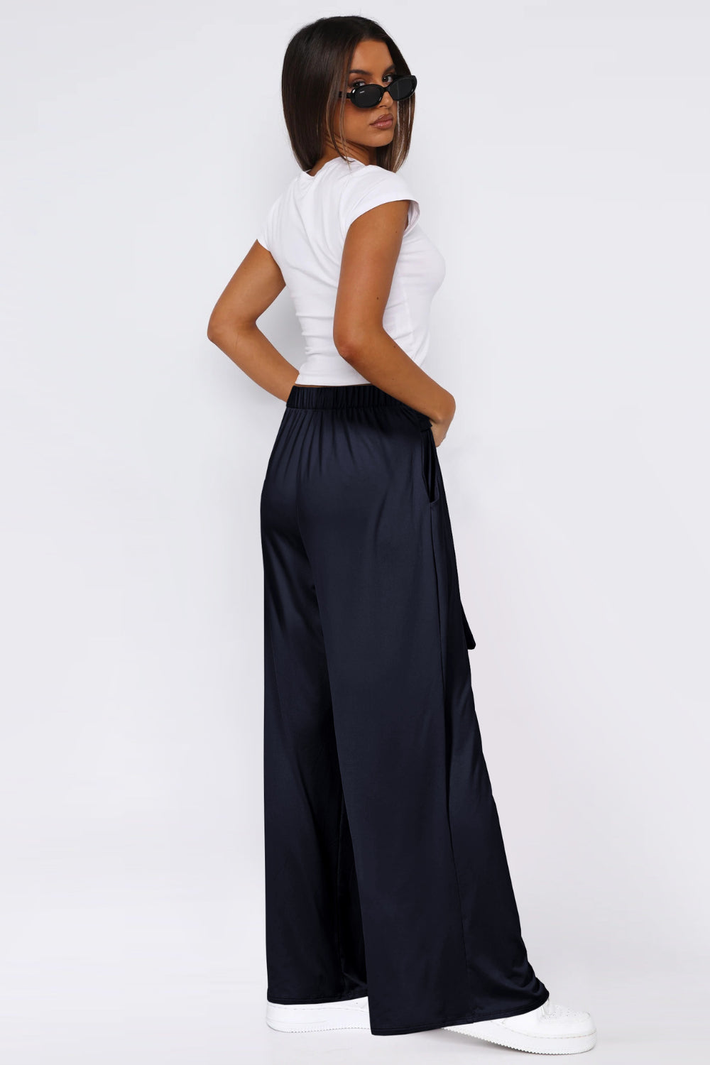 Dark Navy wide-leg flow pants with self-tie detail and pockets.