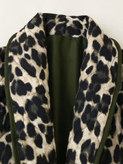 Leopard quilted kimono jacket with green lining and trim, open front detail.