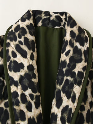 Leopard quilted kimono jacket with green lining and trim, open front detail.