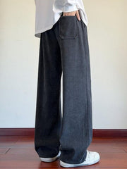 Men's gray textured wide leg sweatpants with a herringbone pattern and a back pocket.
