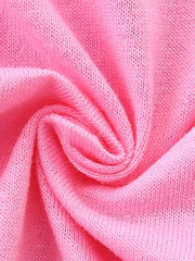 Pink cotton t-shirt fabric with a close-up view of the knit texture.