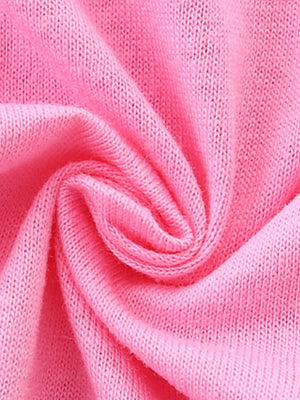 Pink cotton t-shirt fabric with a close-up view of the knit texture.