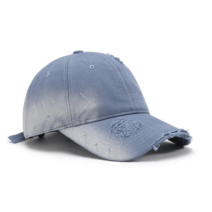Light blue distressed denim baseball cap with frayed details.