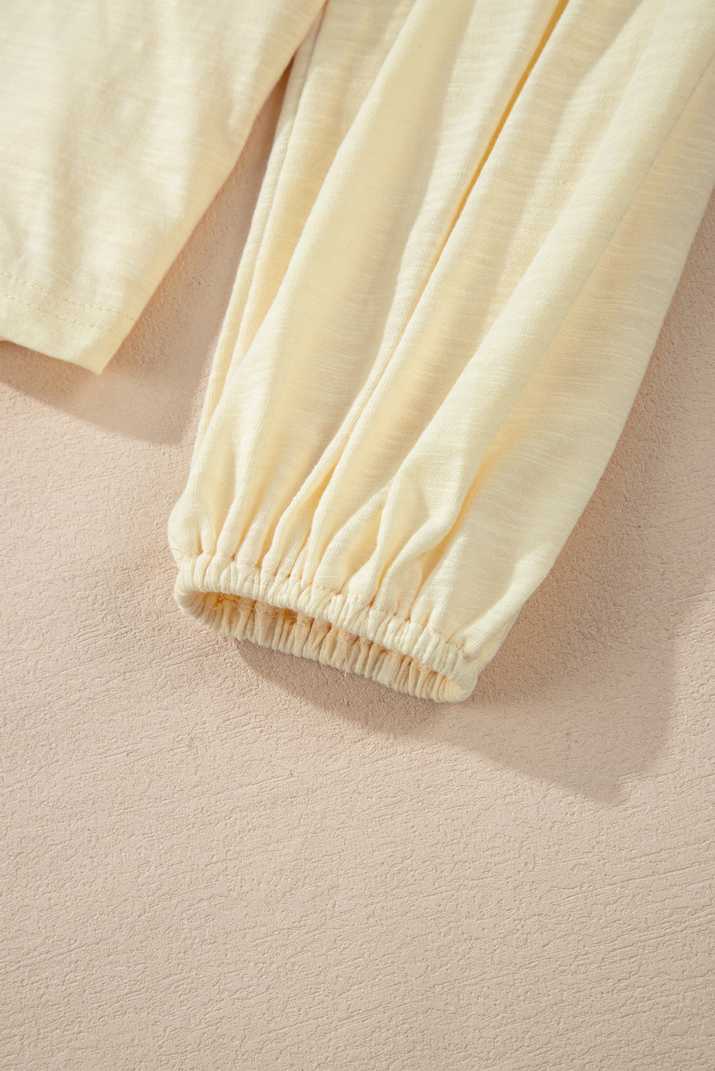 Pastel yellow embroidered poet sleeve blouse cuff detail
