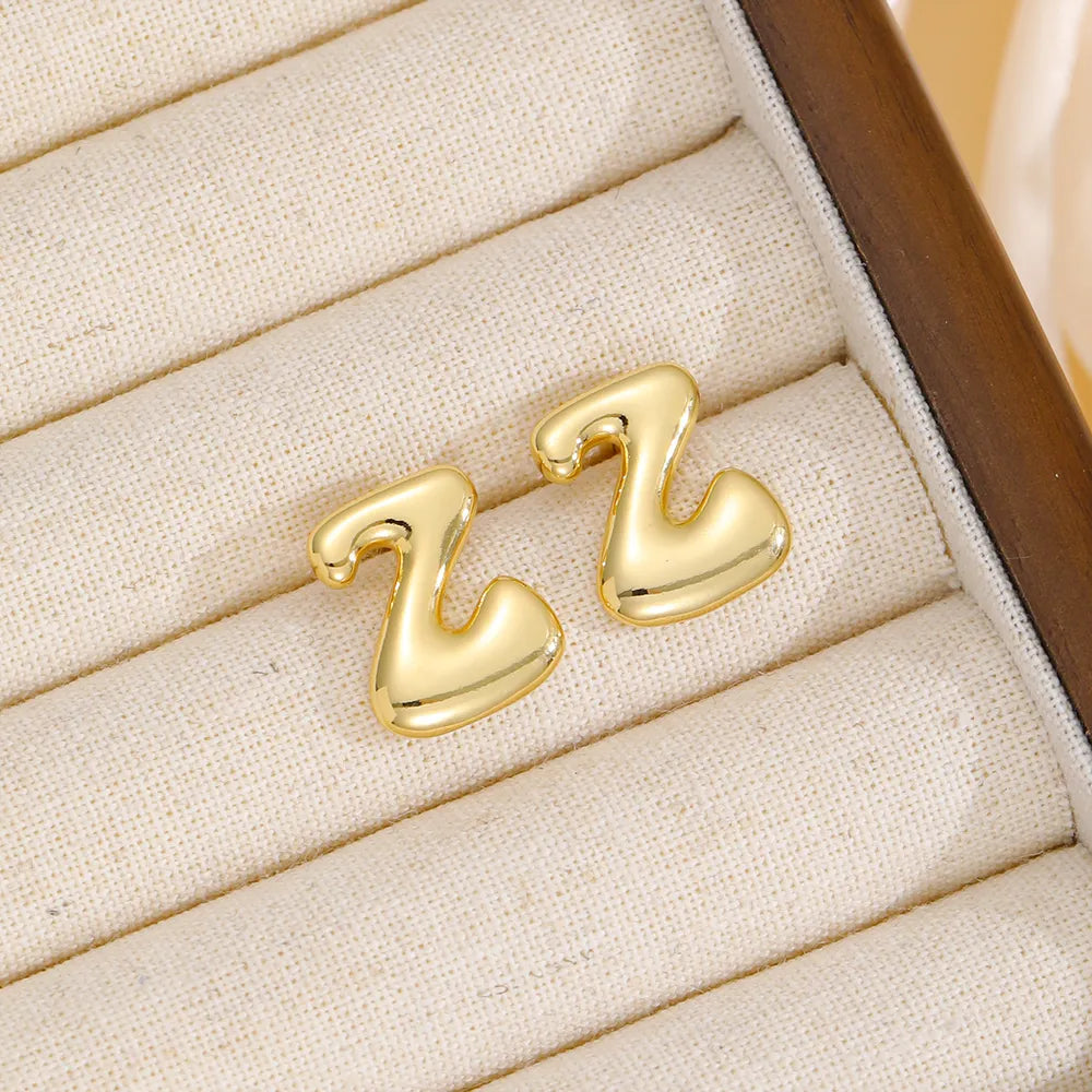 Alphabetical sculpted stud earrings in gold, Style Z
