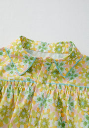 Floral ruffle yoke button-down blouse in yellow green with blue trim detail