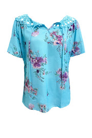 Blue floral blouse with lace yoke and tie-neck detail