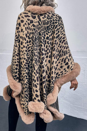Leopard print acrylic cape with faux fur trim in beige, camel, and chocolate colors.