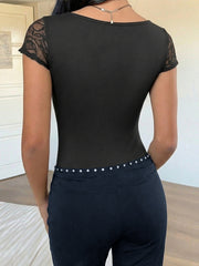 Black lace cap sleeve bodysuit with embellished waist detail