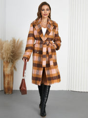 Belted bouclé overcoat with plaid pattern in brown and pink, featuring a tie waist and notched lapels.