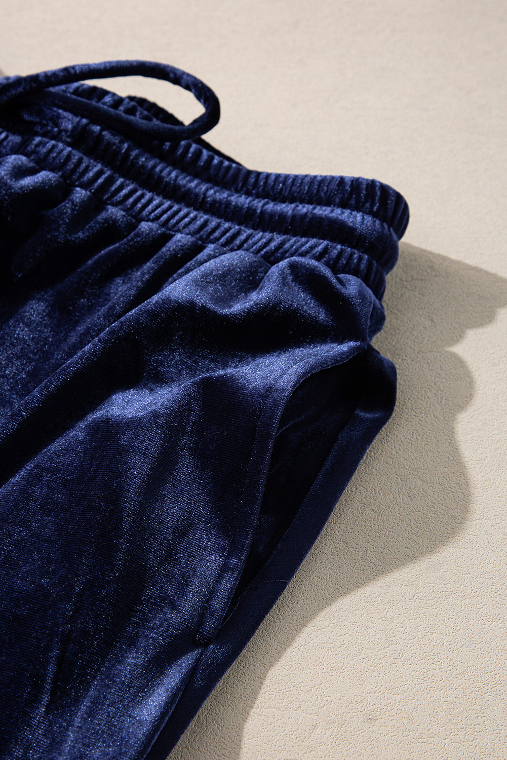 Indigo velvet culotte set with drawstring waist and pockets.