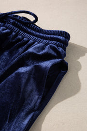 Indigo velvet culotte set with drawstring waist and pockets.