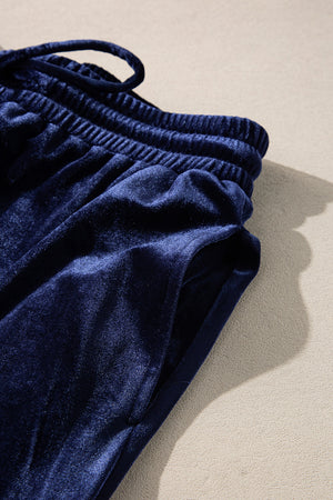 Indigo velvet culotte set with drawstring waist and pockets.
