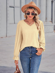 Lemon lace trim eyelet blouse with ruffle cuffs and V-neckline.