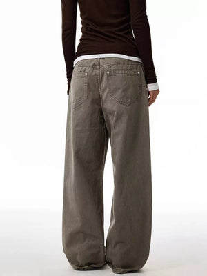 Loose fit men's jeans in coffee brown, 100% cotton, with button fly and casual styling.