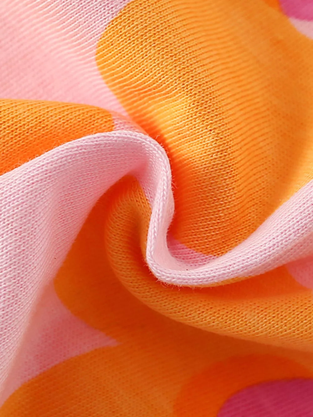 Baby girls' cotton tee and shorts ensemble with a pink and orange floral print.