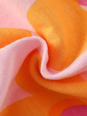 Baby girls' cotton tee and shorts ensemble with a pink and orange floral print.