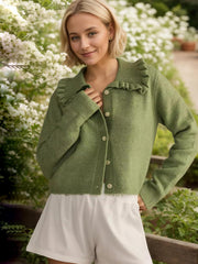 Matcha green knit cardigan with frilled collar and buttons, long sleeves.