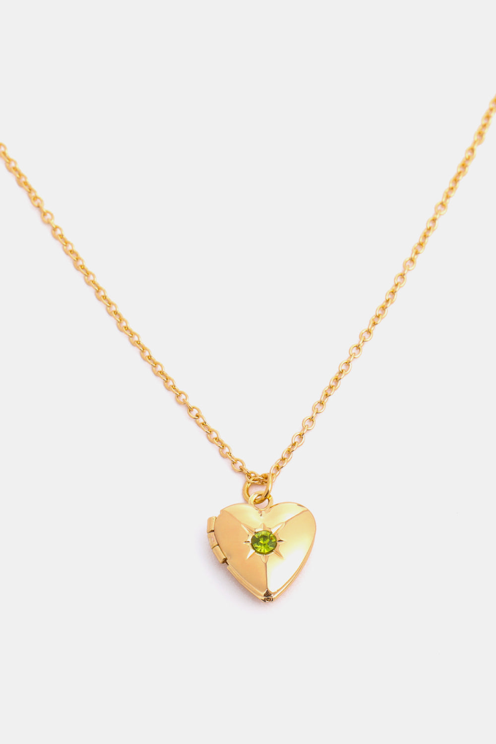 Gold heart locket necklace with green gemstone and 14k gold chain