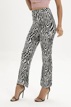 Zebra print flared leg trousers with a high waist.