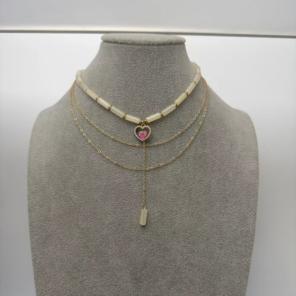 18k Gold-plated Layered Heart Pendant Necklace in Gold, model styling view